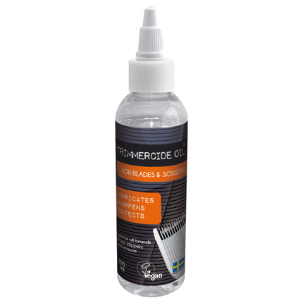 Trimmercide Oil - oil for the maintenance and lubrication of clipper blades and scissors